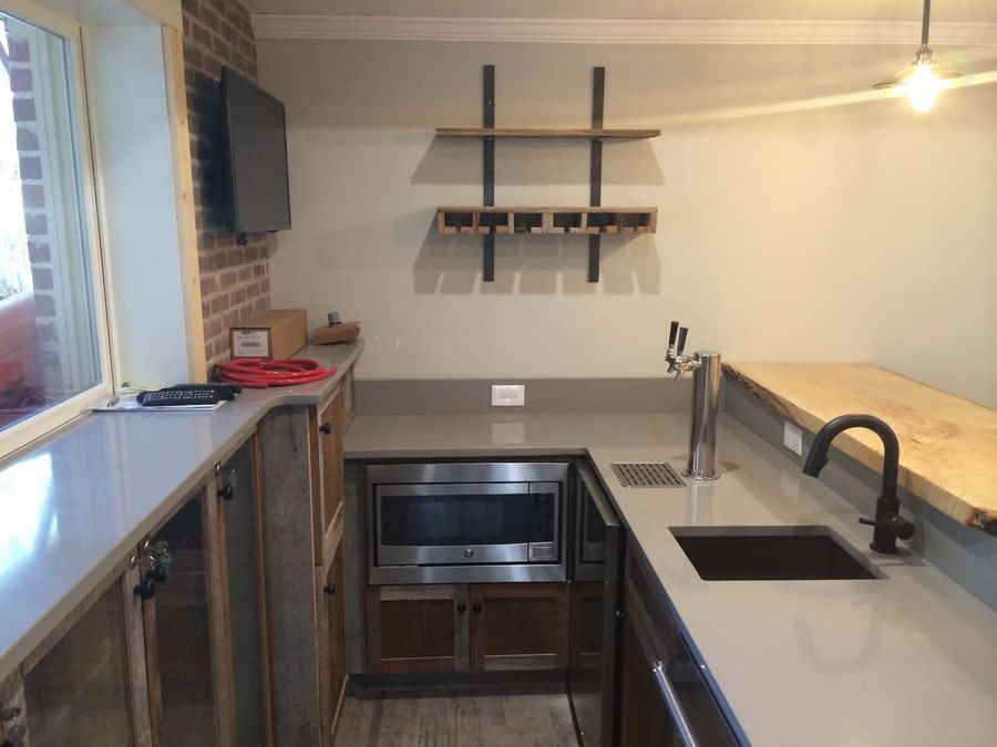 Live-edge bar top with built-in tap