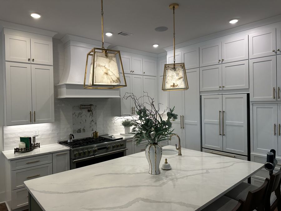Range wall with floor-to-ceiling cabinetry