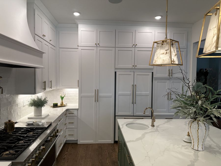 Panel-front refrigerator integrated into the cabinetry run