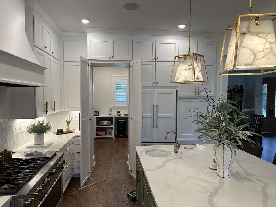 Cabinetry run through to the walk-in pantry